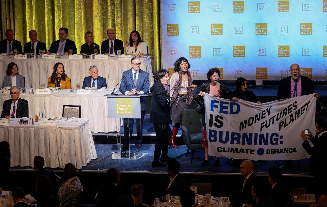 Fed Chair Powell escorted out of room as climate protesters interrupt start of speech