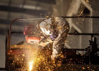 Jobless claims fall to 9-month low of 198,000. Not many layoffs in U.S. economy.