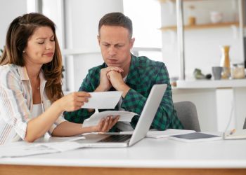 My wife is leasing a new car. Could that hurt my mortgage application or raise my interest rate?