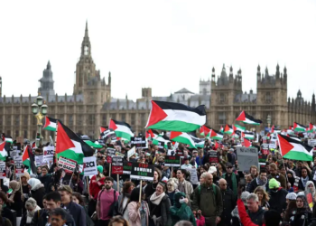 Pro-Palestine protesters march through London demanding an Israeli ceasefire in Gaza