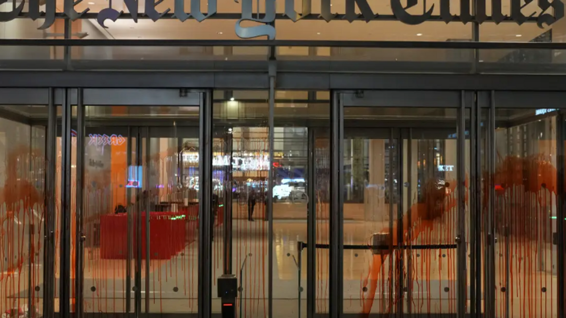 Anti-Israel protesters swarm Grand Central Terminal, splatter fake blood on New York Times building and set Israel flag ablaze