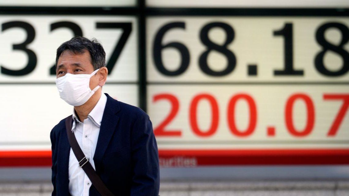 Asian markets mostly lower in quiet trading ahead of Biden-Xi meeting