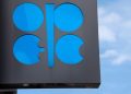 Oil prices settle lower as OPEC+ delays meeting amid reported infighting