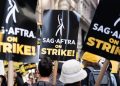 Actors union reaches tentative deal with Hollywood and TV studios, ending historic strike