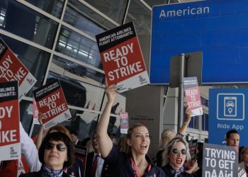 American Airlines’ flight attendants want to strike. But it won’t disrupt your holiday travels