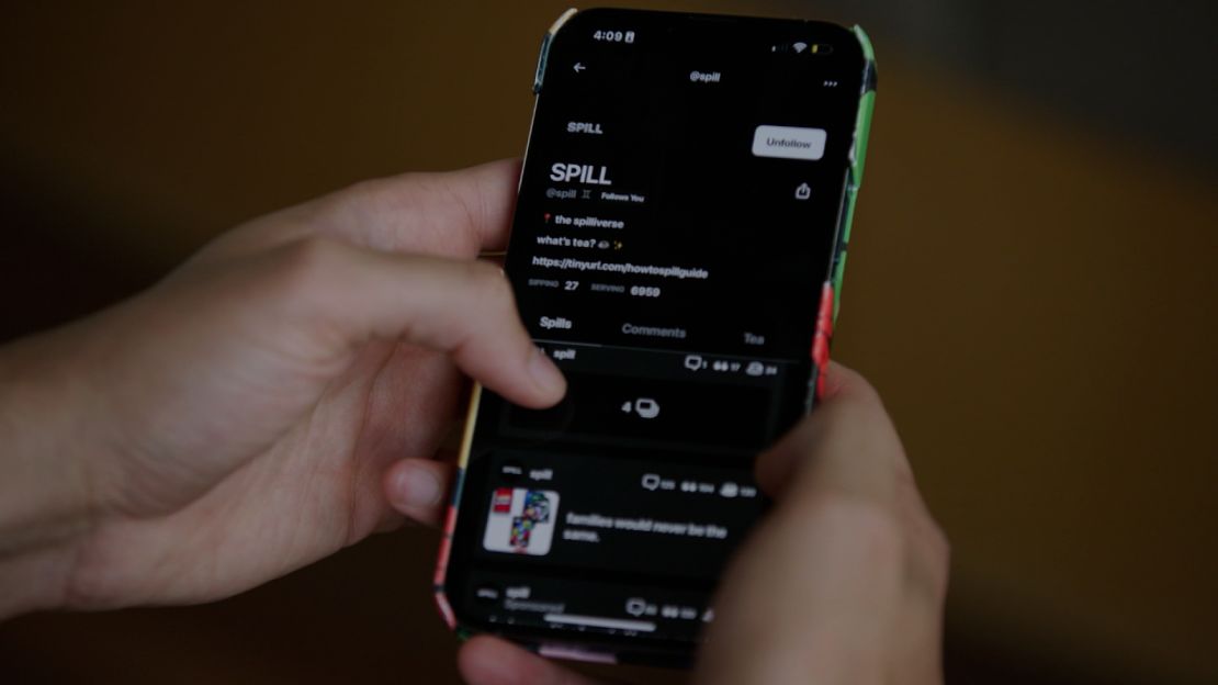 Alphonzo Terrell, co-founder of the social media app Spill, demonstrates how the platform works during an interview with CNN.