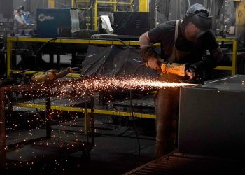 US economic growth revised up to 5.2% in third quarter