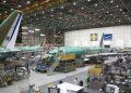 Amid a crisis, Boeing reports record orders and best deliveries in five years