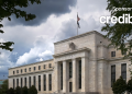 Fed holds steady on interest rates, but outlook on when cuts will come remains cloudy