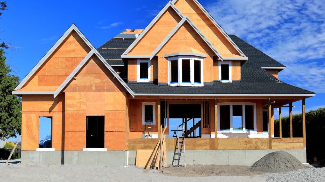 Sales of new homes surged in December as mortgage rates dipped below 7%