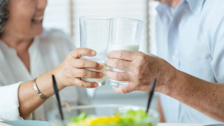 Stock image of people drinking milk