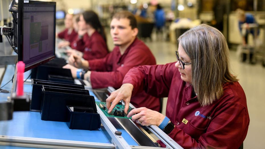 Workers Manufacturing Circuit Boards