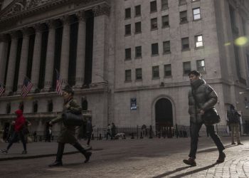 Markets fall as investors worry about low economic growth and stubborn inflation rates