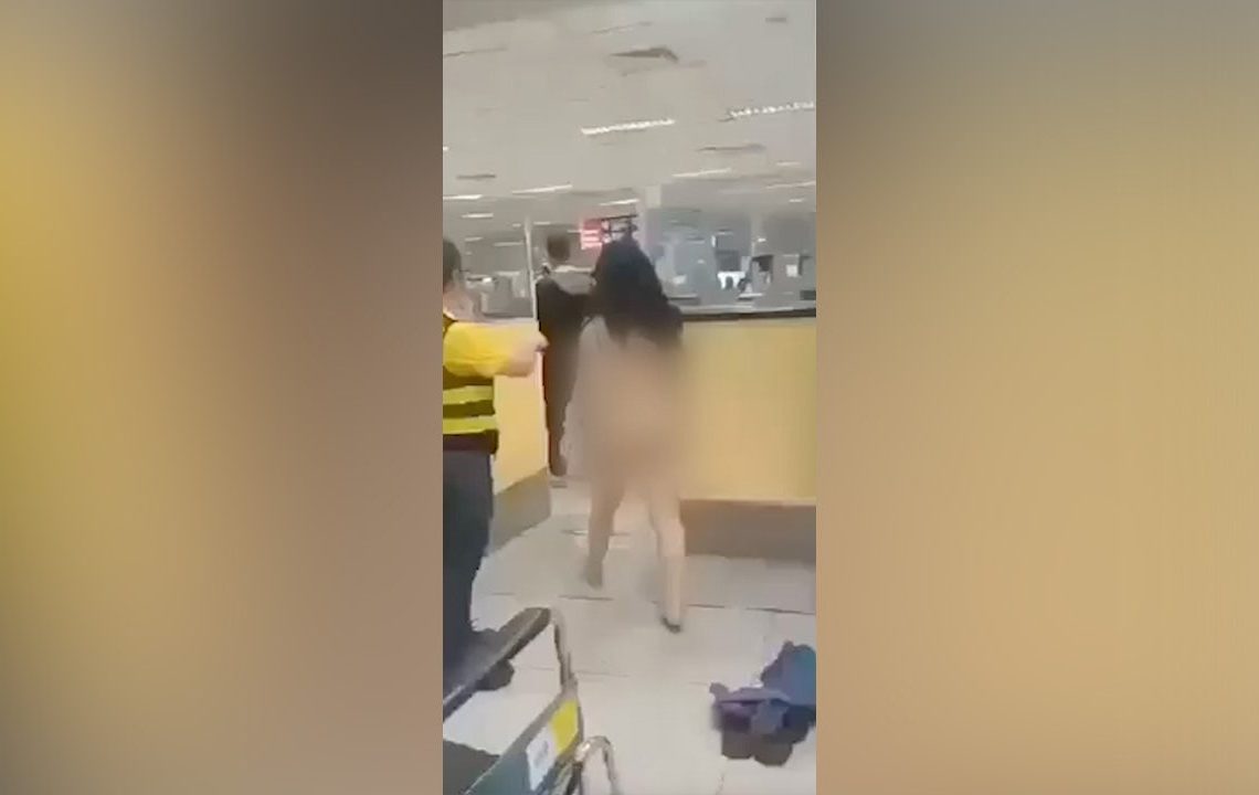 Naked woman in Philippines airport walks through security in fit over visa issue