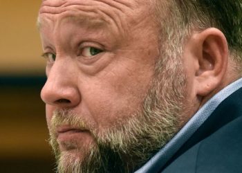Alex Jones agrees to liquidate his assets to pay Sandy Hook families, in move that would end his ownership of Infowars