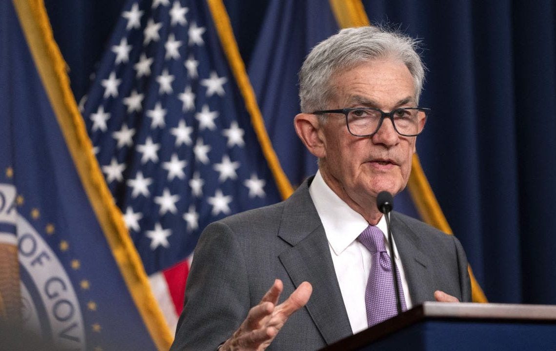 Fed cuts interest rates by quarter point