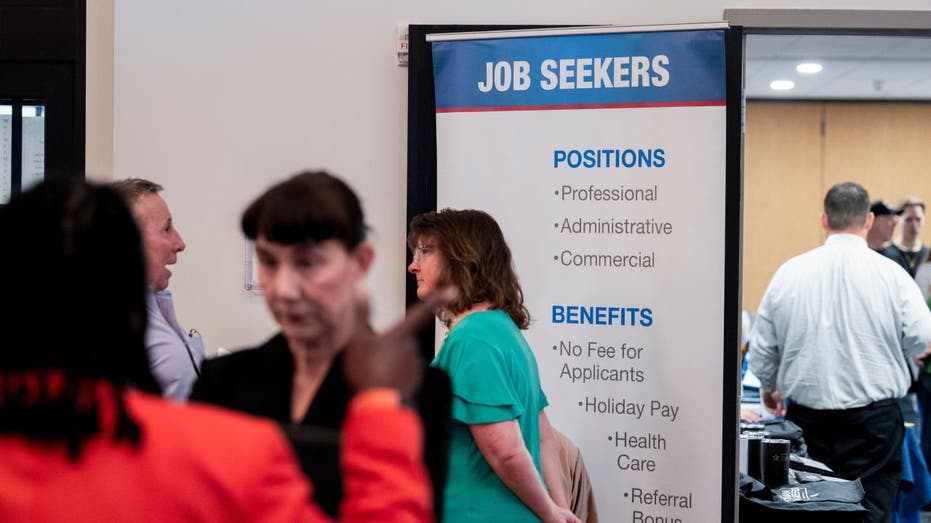 Job seekers and employers at a job fair