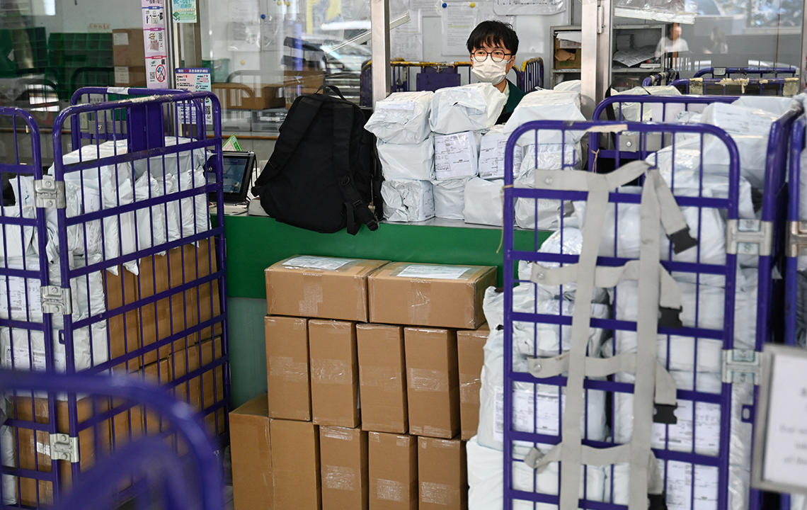 Hong Kong to suspend parcel shipments to US over Trump’s ‘bullying’ tariffs