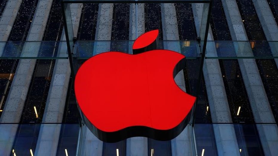 Red Apple logo on building