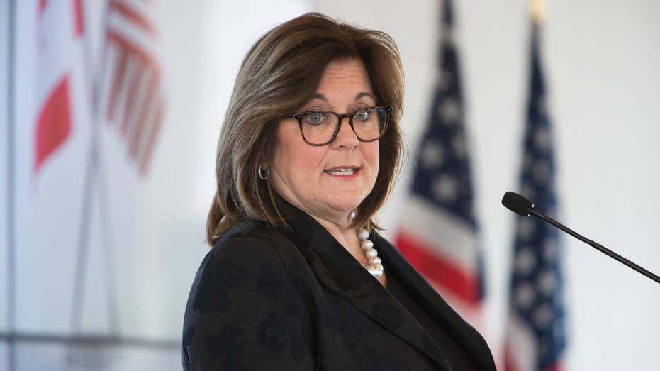 Chamber of Commerce Suzanne Clark speaking into a microphone