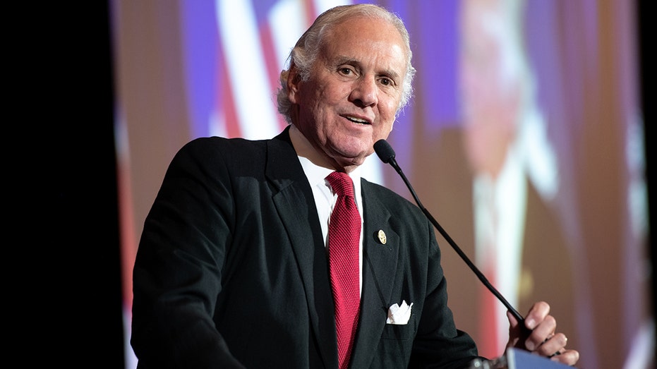 South Carolina Gov Henry McMaster wearing a black suit jacket