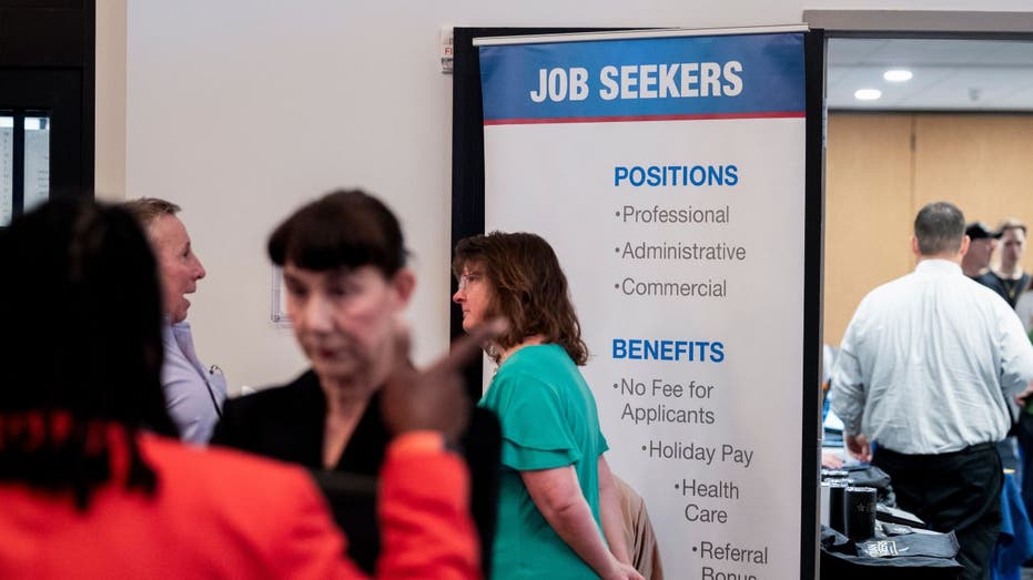 Job seekers and employers at a job fair.
