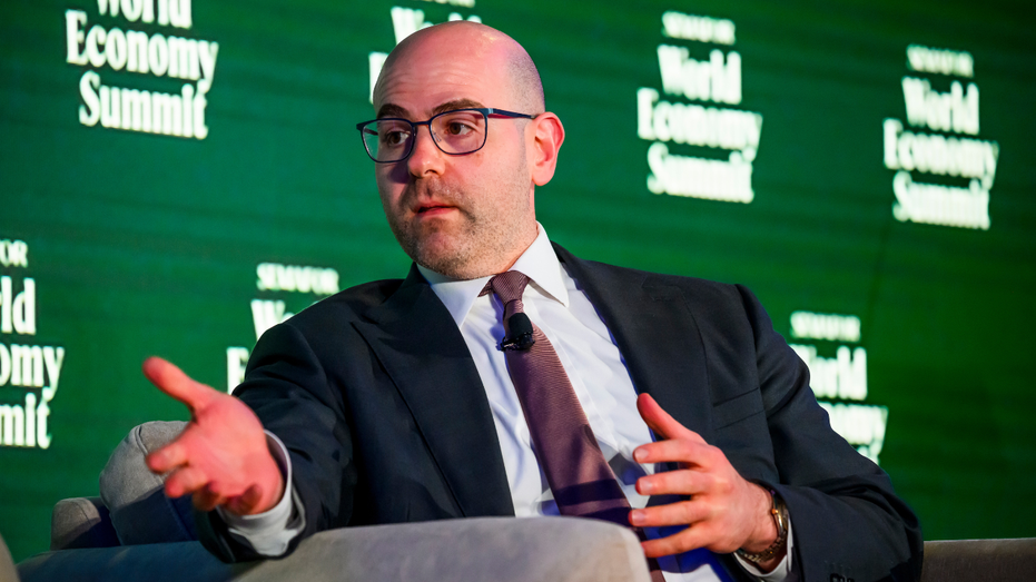 Stephen Miran speaks during a conference