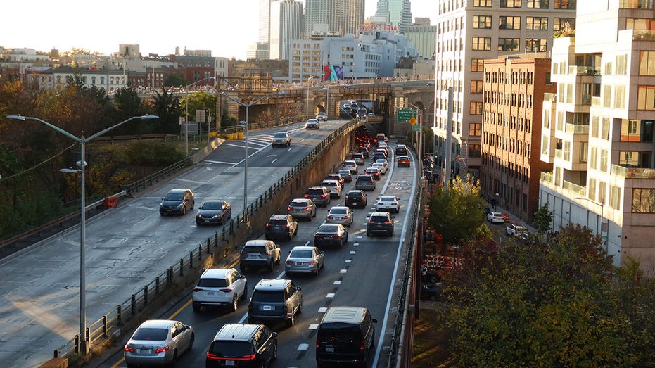 Cars travel on the Brooklyn-Queens Expressway