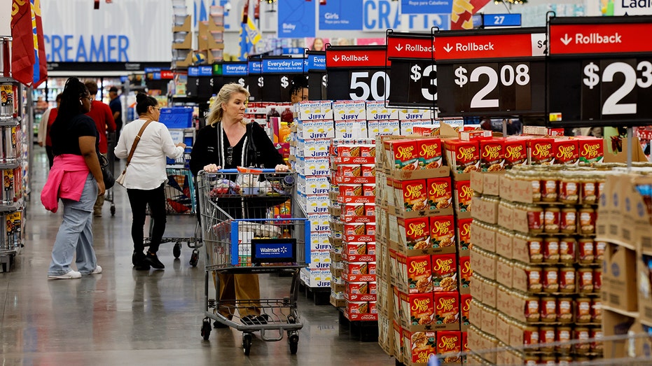 Walmart shoppers in a store.