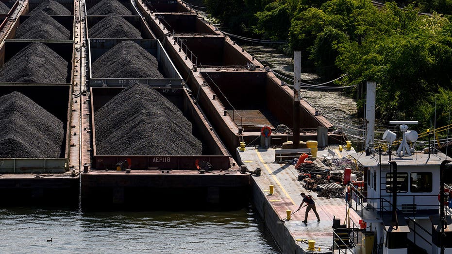 Coal on barges in Pittsburgh, US, on Monday, Sept. 9, 2024. Weekly US coal production was down 13.8% year-to-date for the week ending on August 31 according to the Department of Energy. Photographer: Justin Merriman/Bloomberg via Getty Images
